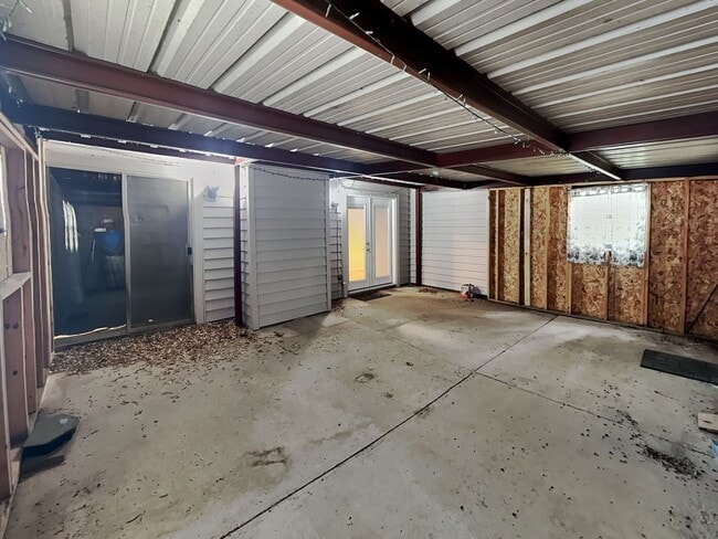 Building Photo - Charming One-Story with Bonus Sunroom & Backyard Retreat in Prime Summerfields Location!