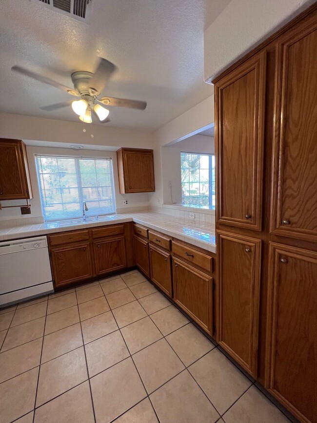 Building Photo - TWO BEDROOM CONDO WITH TWO CAR GARAGE IN H...