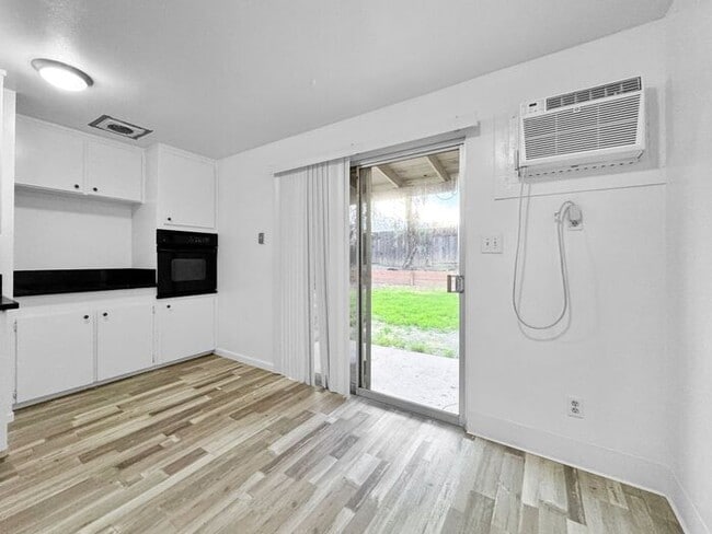 Building Photo - 2BR/1BA House w/ Fenced Yard + Garage In Carmichael