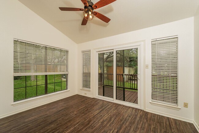 Building Photo - Charming 2-Bedroom Condo in Gated Community Surrounded by Mature Trees