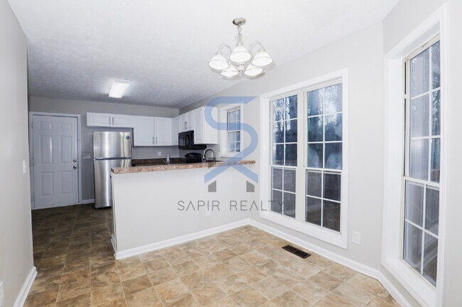 Building Photo - Move in before February 28th and choose your reward: a $250 Amazon Gift Card or a 55" Smart TV!