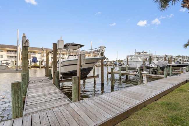 Building Photo - Welcome to Harbor Landing Condominiums — where coastal living meets convenience!