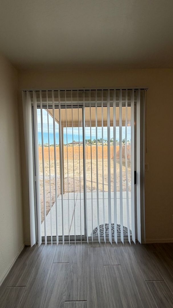 Building Photo - Two Story Home with NEW tile and a large backyard!