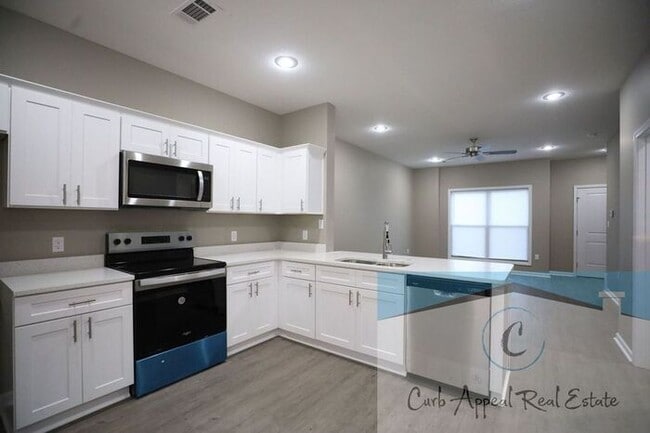 Building Photo - Luxury 2 bed 2 bath apartment - new construction!! Washer, dryer and utilities included!!
