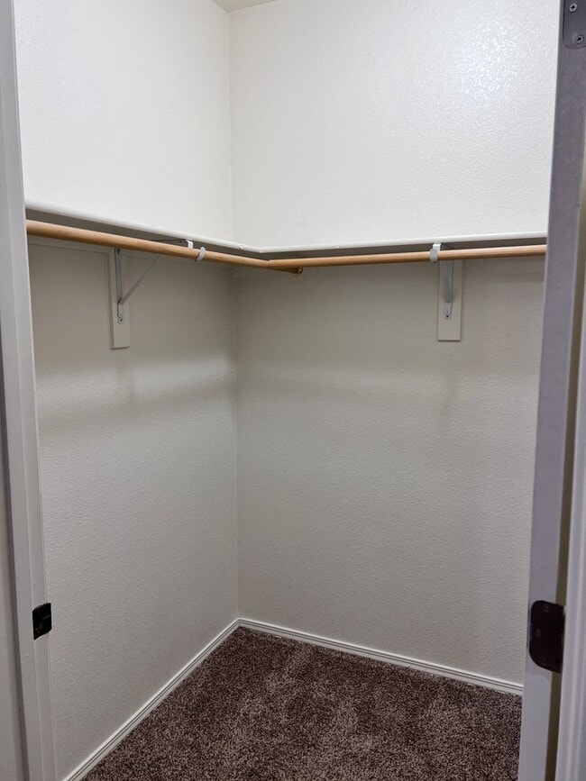 Building Photo - Wonderful 3 Br condo in gated community with the major appliances and 1 car garage.