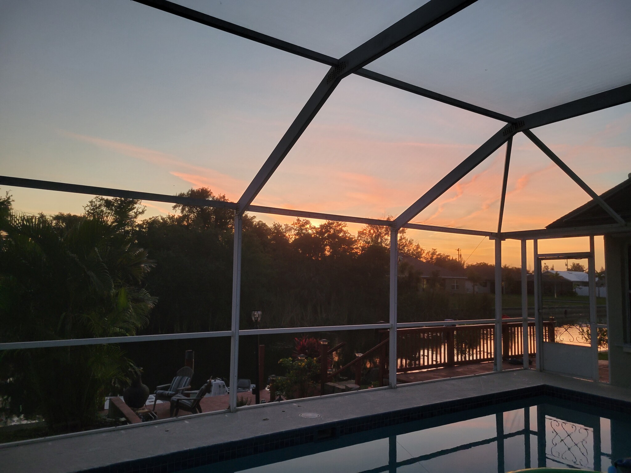 Sunset over Pool Cage - 704 SW 11th Pl