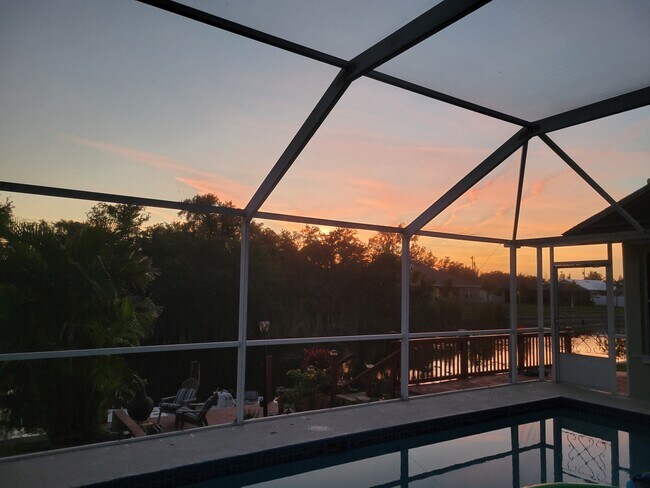 Sunset over Pool Cage - 704 SW 11th Pl