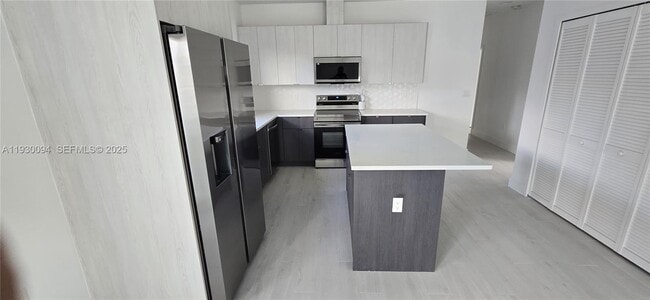 Building Photo - 6820 NW 6th Ct