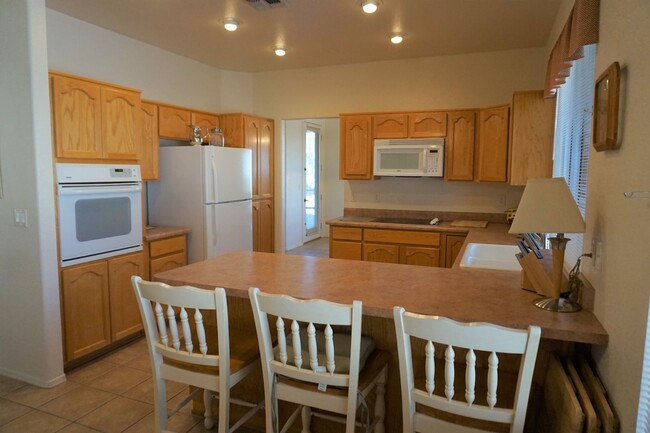 Building Photo - 55+ Gated Community - Fully Furnished - Month to month Term Lease