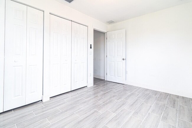 Building Photo - 163 W Blue Heron Blvd