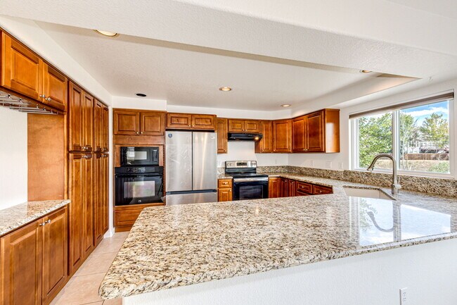 Building Photo - 9476 Morning Glory Way