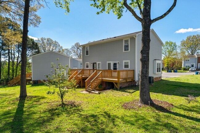 Building Photo - Introducing a Charming End Unit Townhouse ...