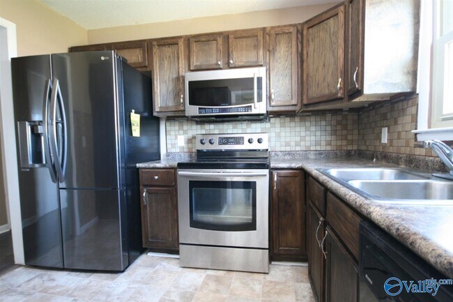 Building Photo - 6206 NW Angus Cir