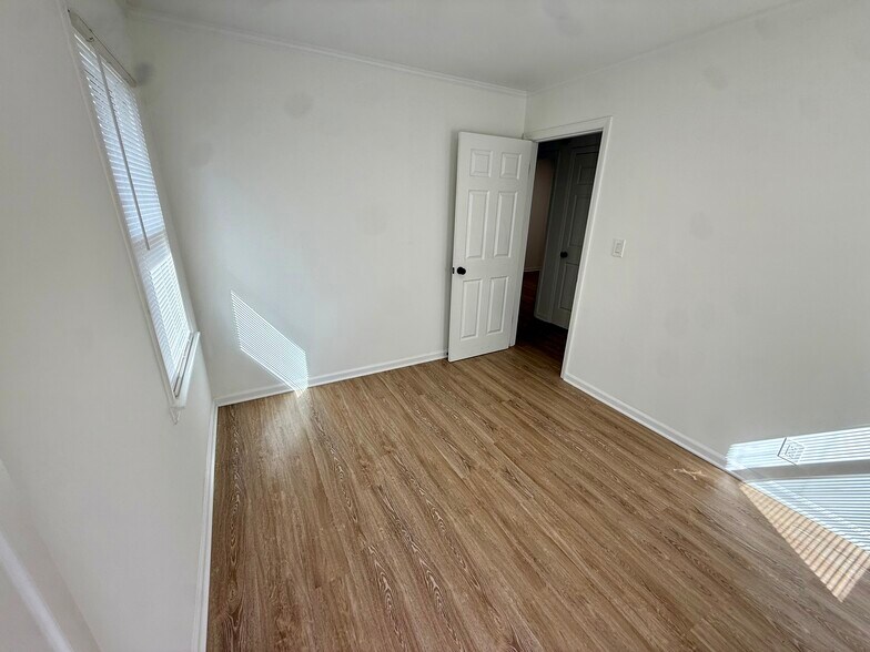 Smaller Bedroom or windowed office (Main floor) - 12 Moore St