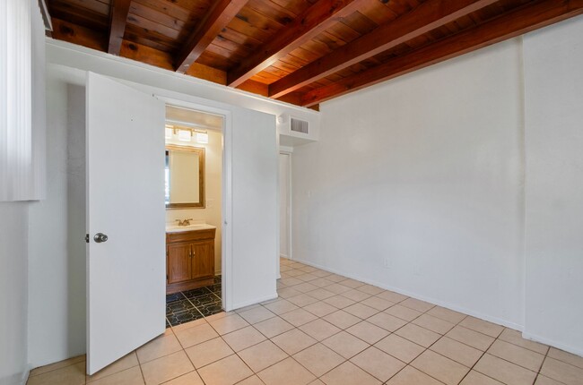 Building Photo - Available March 1, 2026. Updated 2 Bedroom 1.5 Bath Duplex with private dedicated pool.