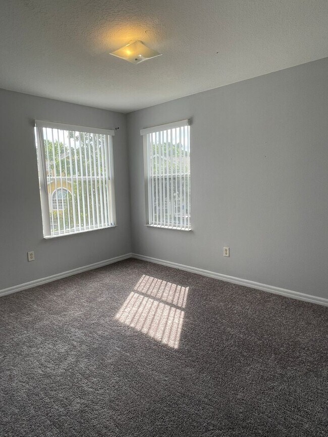 Building Photo - Charming 3-Bedroom, 2-Bath Condo in the Ga...