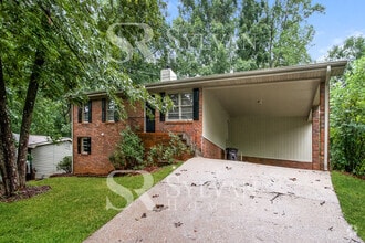 Building Photo - Welcome to this charming abode.