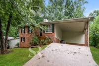 Building Photo - Welcome to this charming abode.