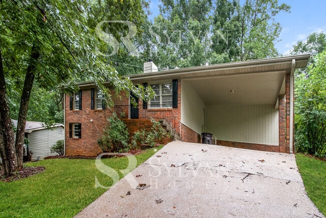 Building Photo - Welcome to this charming abode.