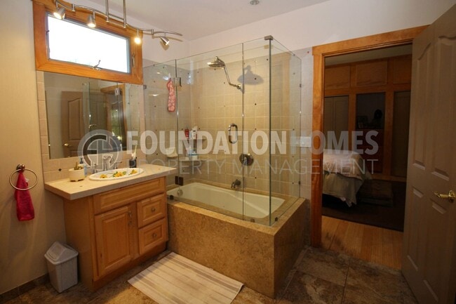 Building Photo - FURNISHED - Enjoy this little piece of par...