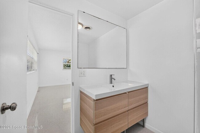 Building Photo - Welcome to this beautifully remodeled 4-bedroom, 3-bath home in the heart of Indialantic Beach!