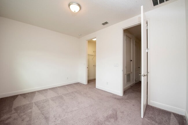 Building Photo - Two story Townhouse 2-bedroom, 2.5 bath in Eagle Creek of Lake Nona