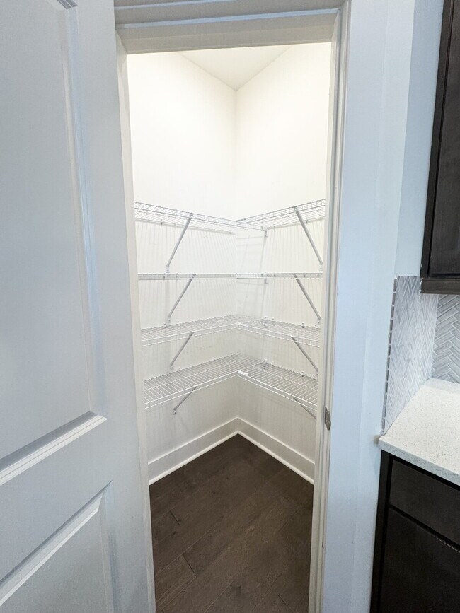 Building Photo - Stylish 3BR Townhome with Private Yard & T...