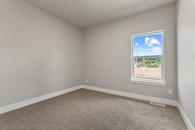 Building Photo - Newly built 4 Bedroom Duplex With Garage