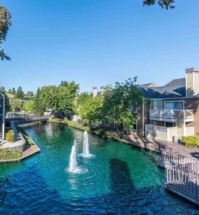 Building Photo - Beautiful 2-Bedroom Condo with Serene Wate...