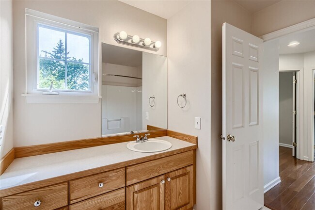 Building Photo - Spacious 4-Bedroom Home in Kenmore | Private Greenbelt Setting + Landscaping Included