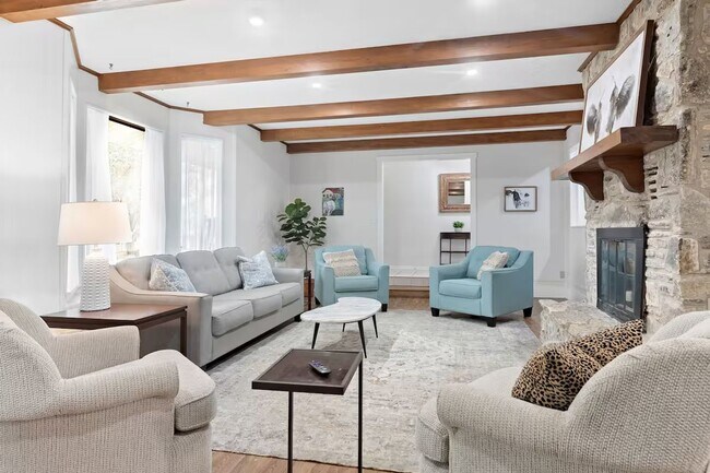 Building Photo - 3 Bed, 3 Bath Home with Expansive Kitchen, Two Living Areas & Private Suite