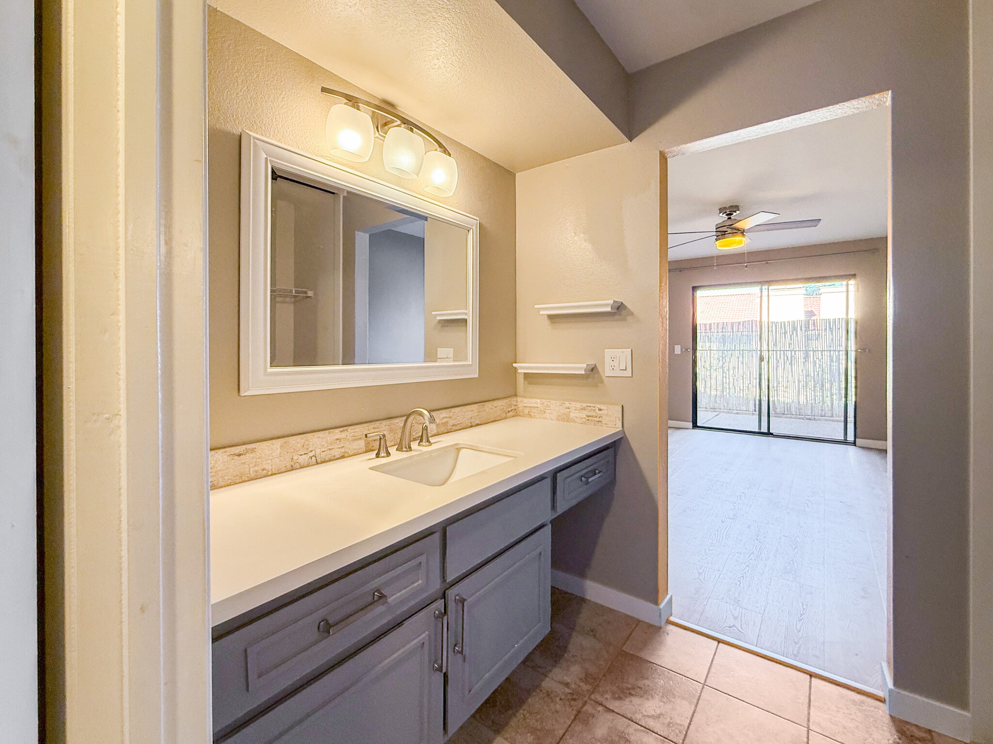 Primary bathroom leading to bedroom and slider to the patio - 3086 Corte Trabuco