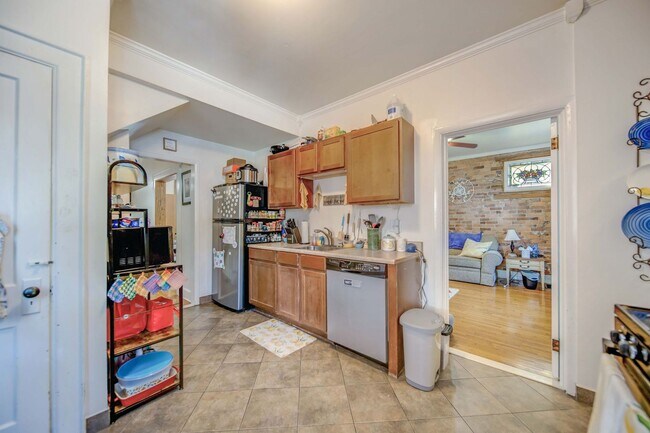 Building Photo - Charming 5-Bedroom Home with Exposed Brick and Modern Upgrades