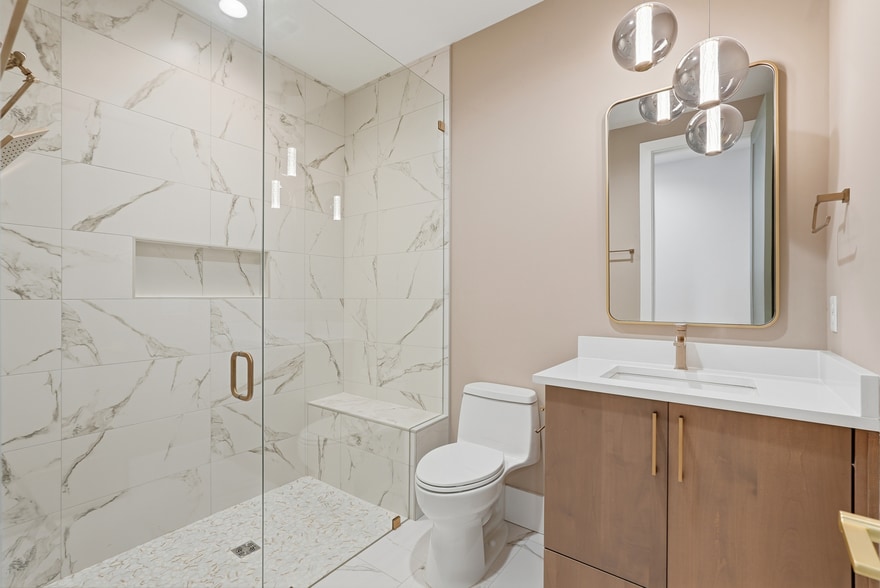 Modern bathroom featuring clean finishes, sleek fixtures, and a bright, refreshed feel - 3718 West End Ave
