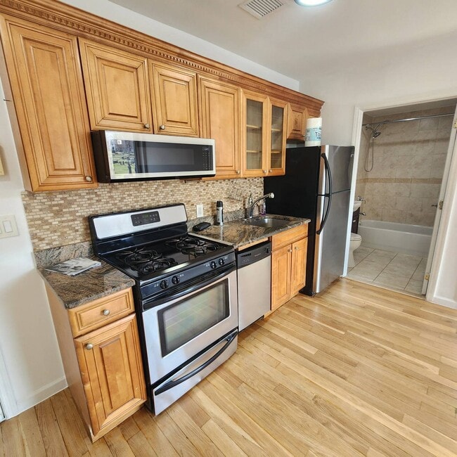 Building Photo - 66-83-83 70th St