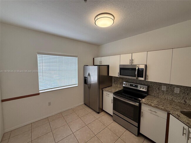 Building Photo - 5620 NW 114th Path