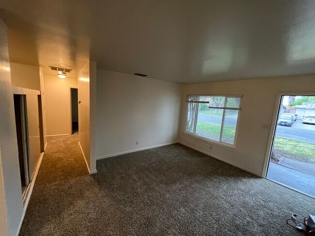 Building Photo - Updated 3 Bedroom with Large Yard
