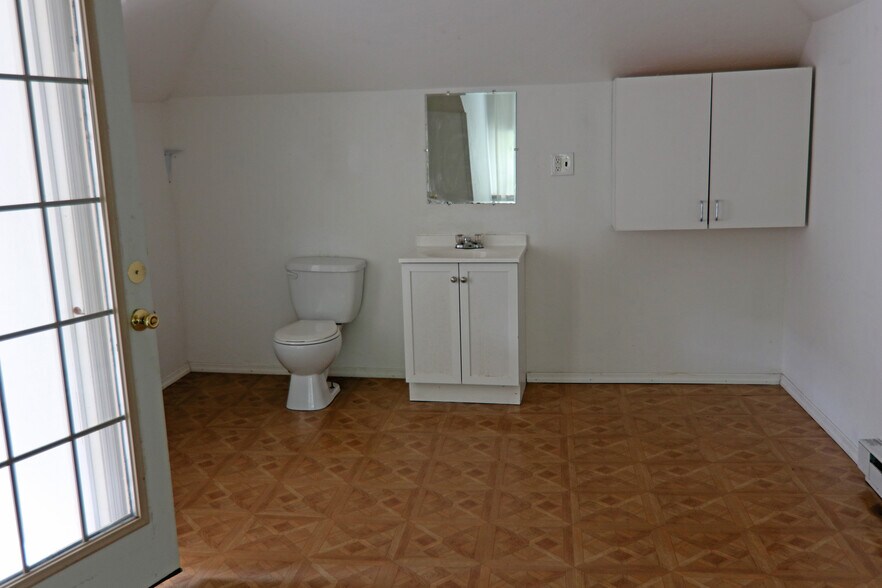 3rd floor bedroom sink and toilet - 348 Chittenden Ave