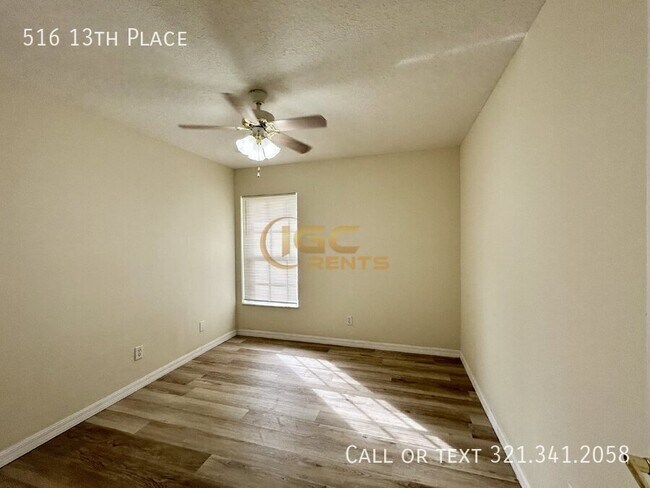 Building Photo - 516 13th Pl
