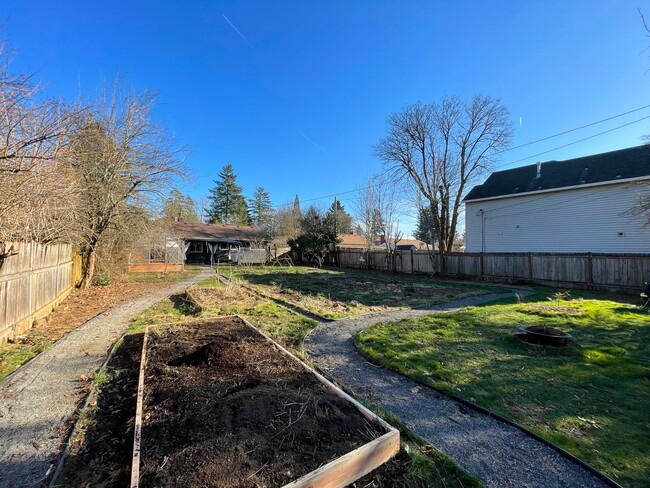 Building Photo - Gardener’s Paradise! Lovely Bungalow with ...