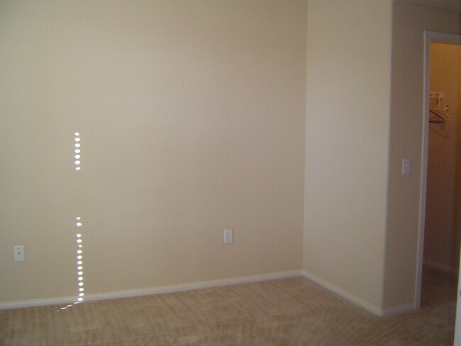 Building Photo - Move-In Ready Condo with Private Balcony & Modern Upgrades