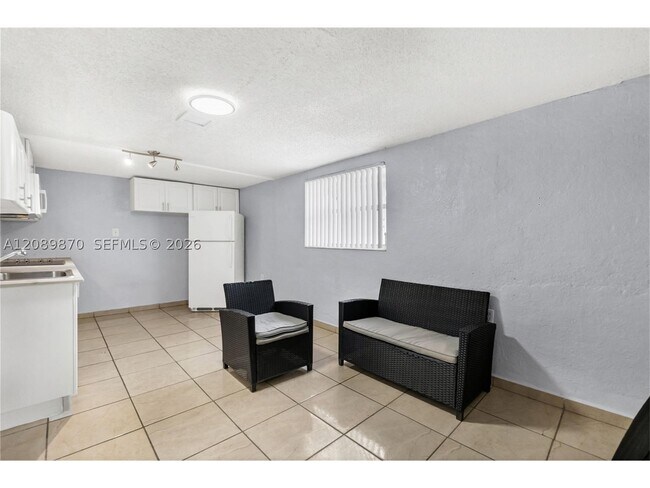Building Photo - 6049 W 14th Ln