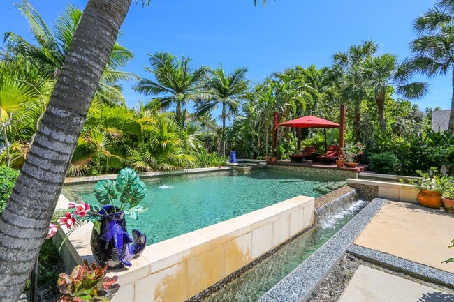 Building Photo - **TROPICAL PARADISE**3BEDS/2BATH POOL HOME...