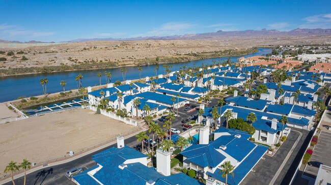 Building Photo - Live ON THE COLORADO RIVER – Fully Furnished 1 Bed/1 Bath Condo in the Gated Community of Roadhav...