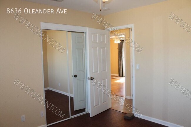Building Photo - 8636 Oleander Ave