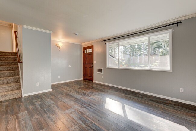 Building Photo - Spacious 4-Bedroom Home with Fireplace, Fenced Yard, and 2-Car Garage