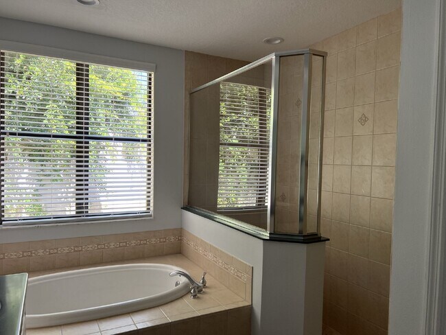 Building Photo - "Elegant 3-Bed, 3-Bath Home with a heated ...