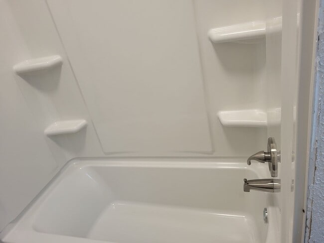 Building Photo - Available July 5, 2026! Spacious 4 bedroom...