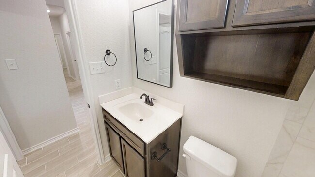 Building Photo - Welcome home to this beautifully designed 4-bedroom, 2.5-bathroom gem!