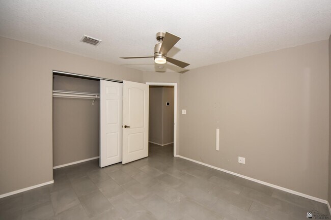 Building Photo - 8215 Forget Me not St